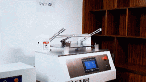 Automated hinge cycle testing rig running fatigue test on heavy-duty industrial hinges.