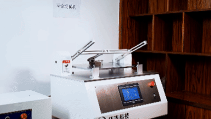 Automated hinge cycle testing rig running fatigue test on heavy-duty industrial hinges.